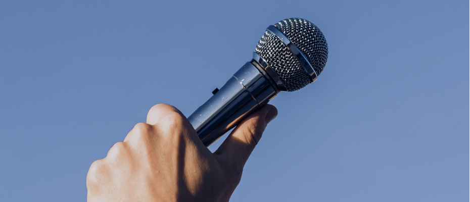hand holding microphone