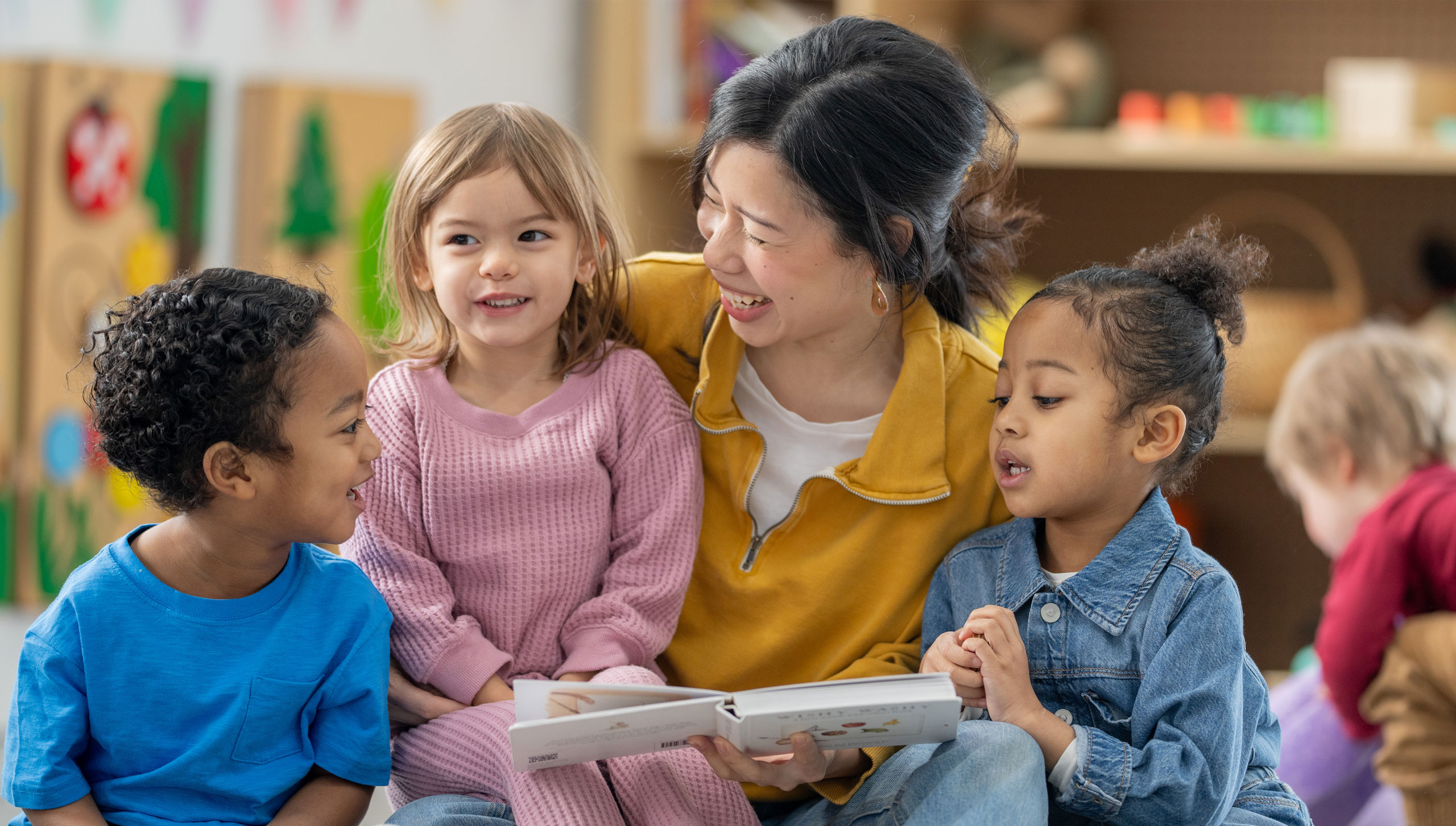 woman teaching class of children childcare ywca cortland